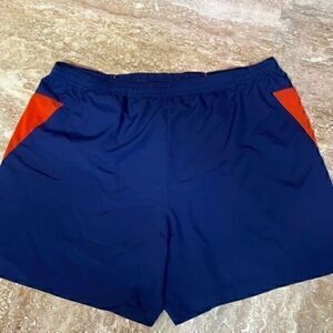 SUGOI men’s cycling shorts. Navy blue/orange. Size L.